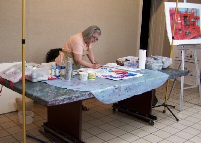 Deb shows how to paint a technique by Nick Simmons - the "batik like look".